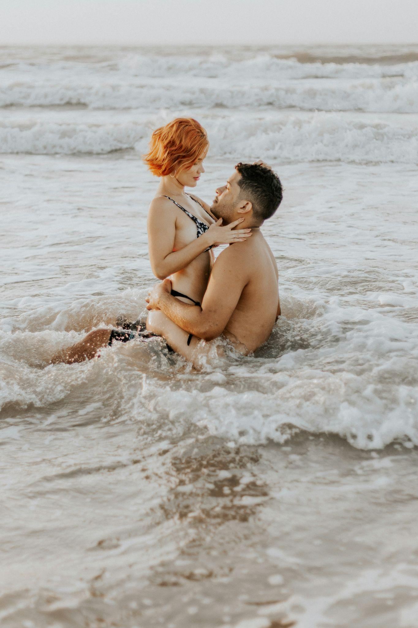 Babies playing at the water's edge