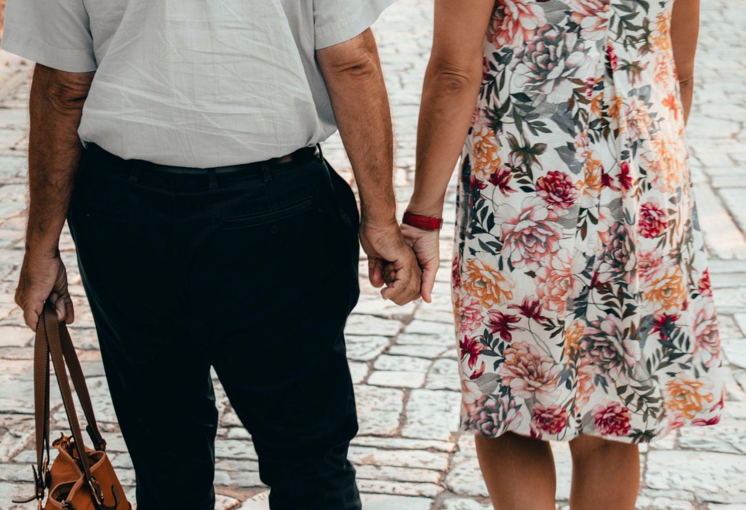 Holding hands on a walk, decades in